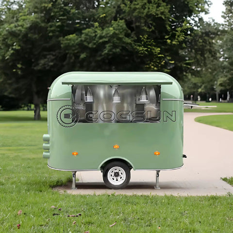 Ready To Rock 10ft Mobile Food Trailer Built On Galvanized Steel Frame With Sleek Mirror Exterior Perfect For Coffee Kiosks Snack Shacks Or Pop Up Catering Got Your Back Every Day, rear view in park.