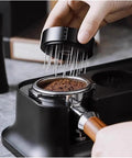 Pro Stainless Steel 58mm Coffee Distributor And Tamper With Slow Rebound Spring Crush Channeling on espresso grounds.