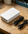 Keep The Wifi Alive With This Solid 7800mAh UPS Battery Backup Powers Your Router And Modem For Six Hours Flat Even During Blackouts with cables.