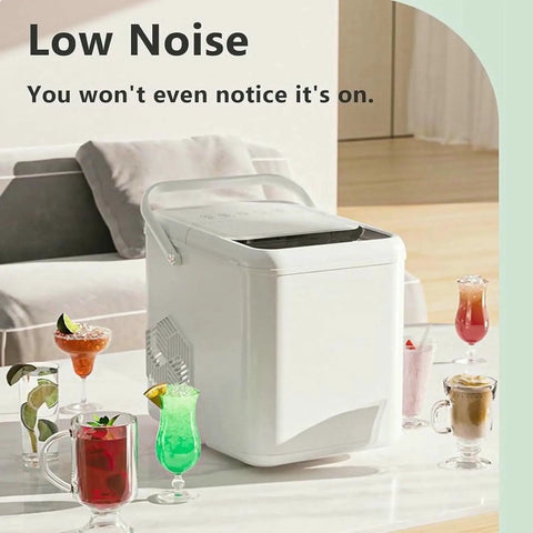 Electric Countertop Ice Maker Featuring Self Cleaning Tech And Rapid Bullet Cube Production In Just Six Minutes With A Nifty 12 Kilogram Daily Output That Slams On Any Counter Comes Packed With A Scoop And Basket For Dope Home Bartending Sessions on a counter next to colorful cocktails.