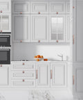 Modern kitchen with 7 and a half inch antique copper cabinet pulls handles solid zinc alloy square drawer pulls installed on white cabinets.