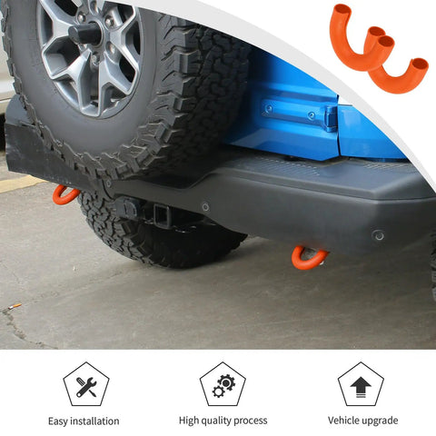 Ford Bronco Rear Bumper Tow Hook Covers 2 Pack Orange Rubber Sleeve Protectors on vehicle back 2021-2024