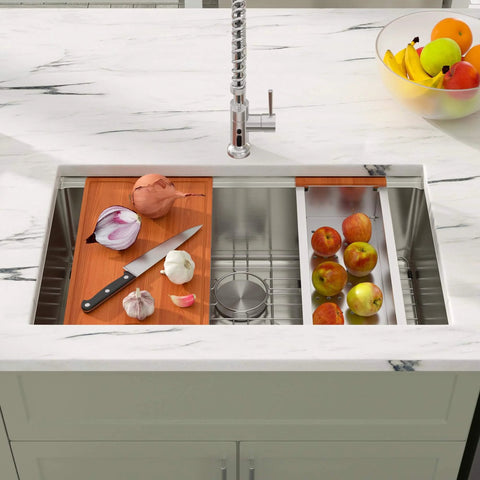 Undermount 33 Inch Stainless Steel Workstation Kitchen Sink Heavy-Duty 16 Gauge 304 Handmade Welded Construction With Accessories Round Corner Brushed Wear-Resistant Finish Deep Single Bowl Measures 33x19x10 Inches Model DCU7701 installed with cutting board and colander.