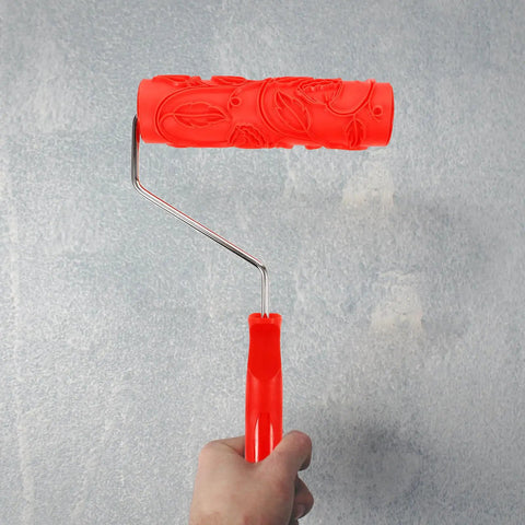 Professional Grade Slick Wood Grain Texture Paint Roller For Interior Wall Decoration with red rubber handle on wall.