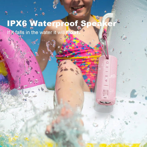 Outdoor Portable Bluetooth Boombox Speaker Waterproof, True 16W Power Sound With 100 Ft Bluetooth 5.3 Range, Crisp Highs And Punchy Bass, Ideal Gift For Women Moms Wives Pink, shown poolside with water splashes.