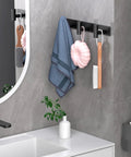 Heavy Duty Stainless Steel Wall Mounted Coat Rack With 3 Hooks Built To Last In Black Finish installed in a bathroom