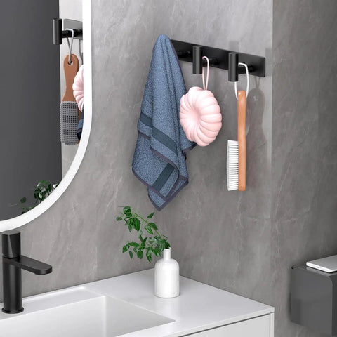 Heavy Duty Stainless Steel Wall Mounted Coat Rack With 3 Hooks Built To Last In Black Finish installed in a bathroom