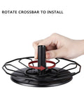 Hand installing base of K Cup Holder Carousel 3 Tier For Keurig Pods Storage Stand Metal Small Footprint 360 Degree Rotation