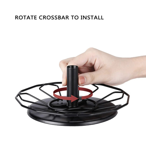 Hand installing base of K Cup Holder Carousel 3 Tier For Keurig Pods Storage Stand Metal Small Footprint 360 Degree Rotation