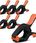 Six Pack Heavy Duty Spring Clamps, 7 Inch Plastic Clamps With 3.7 Inch Jaw Opening, shown in set with orange handles