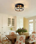 3 Light Industrial Semi Flush Mount Ceiling Light In Black Farmhouse Style illuminating a kitchen with floral decor.