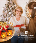Gen2 Solar Lanterns Outdoor With Ultra Real Flame gift exchange by Christmas tree, showing product in festive setting.
