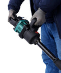 Heavy Duty One Inch Pneumatic Impact Wrench Pumping Out Badass 1900 Ft Lbs Of Raw Torque held by a mechanic wearing gloves.