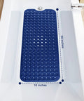 Extra Long Non Slip Bath Mat 39 X 16 Inch Machine Washable Shower Rug With Heavy Suction Cups And Fast Drain Holes Navy Blue in tub.