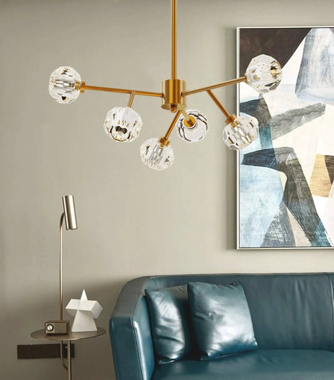 Brass Sputnik Crystal Ball Ceiling Light, Semi Flush Mount, Adjustable Rod 6 To 54 Inches, Polished Gold Finish over sofa.