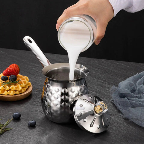 600ml Turkish Coffee Maker Stainless Steel Pot With Eagle Spout, milk being poured, non slip handle, dustproof lid nearby