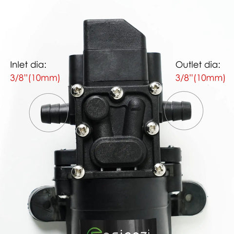 Close-up of 12 Volt Fresh Water Pump For RV Camper Boat And Lawn With Self Priming Diaphragm, showing inlet and outlet measurements.