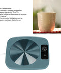 Smart Coffee Mug Warmer Keeps Your Morning Brew Cozy At Steady 131 Degrees With Usb Powered Thermal Control Solid Choice For Desk Office Or Car Setup Coffee Enthusiasts Stoked On Consistent Heat In Green on a tabletop with a steaming mug.