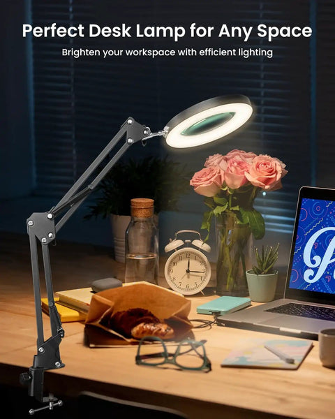 Hands Free Desk Magnifier With Light And Clamp, 10X Real Glass Lens illuminating workspace with flowers and laptop.