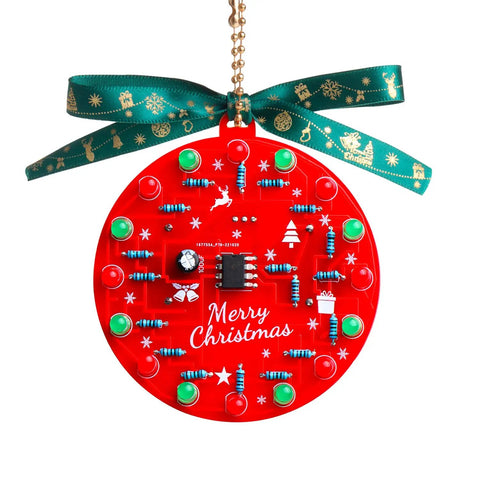 Starter Soldering Kit for Christmas Projects with LED Light Up Tree Decor showing red circuit board ornament.