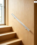 Rock Solid Wall Mounted Stair Handrail Forged From Premium Stainless Steel With Scratch Resistant Finish For Heavy Duty Support Up To Two Hundred Pounds And No Sweat Indoor Installation Today on wooden stairs.