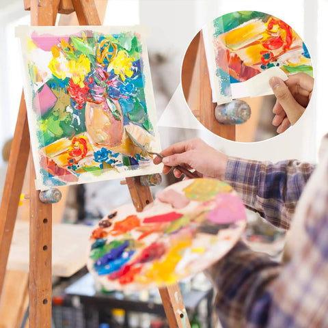 Artist painting on a canvas using 1 Inch Masking Tape Bulk Pack 20 Rolls Of White Beige Crepe Paper Tape With Strong Adhesive 55 Yards Each