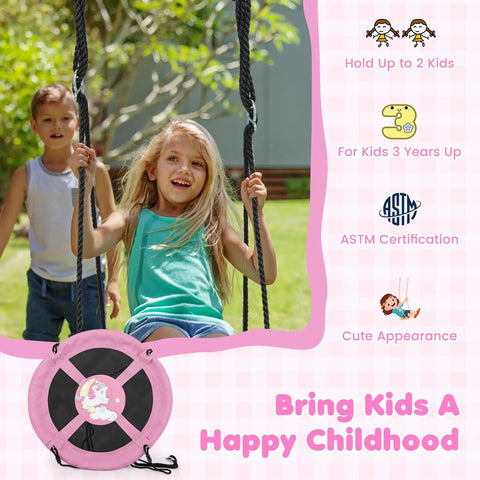 Child smiling on 40 Inch Pink Unicorn Saucer Swing for Kids With Adjustable Ropes and 2 Carabiners Waterproof 900D Oxford Cloth.