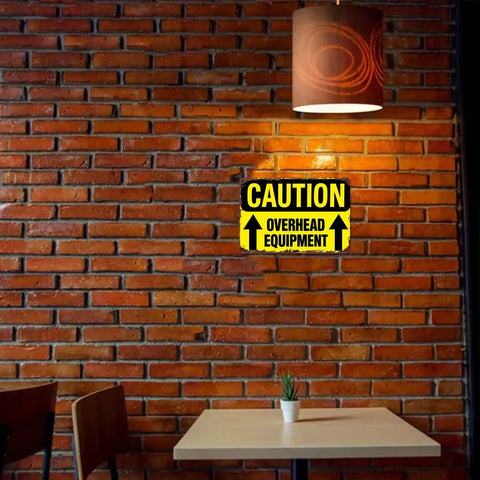 Funny Dope Caution Overhead Equipment Metal Sign 8x12 Inch Aluminum Wall Decor in a cozy brick-walled room