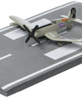 Runway24 F4U USN Die Cast Aircraft With Buildable Runway Deck And Gear Realistic Navy Plane Toy on gray runway section