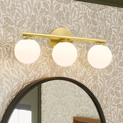 Rock A Stylish Mid Century Modern Vibe In Your Bathroom With These Three Light Gold Vanity Fixtures Complete With Frosted Milk Glass Globes And A Brushed Gold Frame That Is Dimmable Wall Mount Ready