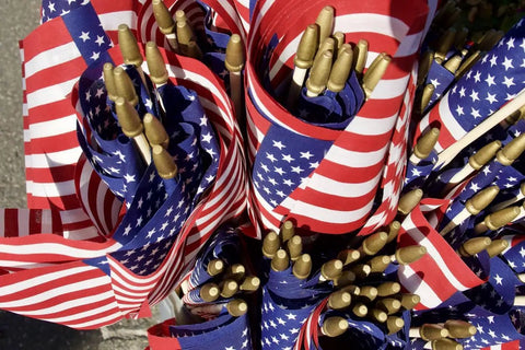 Close-up of 12 Pack Small American Flags 4x6 Inches Hand Held Stick Flags Spear Top Made In USA Patriotic Mini Flags For Parades