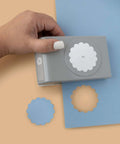 Hand using 2 Inch Scallop Circle Paper Punch For Scrapbooks And Card Making, Metal Craft Punch With Stackable Design That Locks Shut, Gray Finish