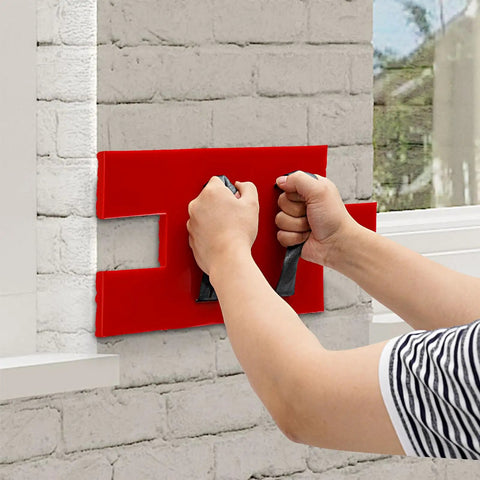 Hands holding Red Concrete Stamp Mat 17.9x7.8 Stone Texture PU Mold For Stamped Concrete Patio And Driveway on wall