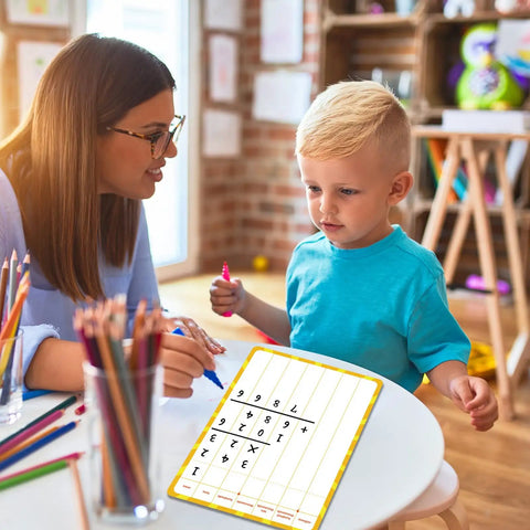 Teacher and child using 12 Pack Double Sided Whiteboards 9x12 Inches For Math Practice Long Division Dry Erase Lapboards at table