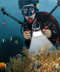 Diver using Underwater Video Light With 84 LED Power, Dimmable Waterproof Dive Light for GoPro, illuminating coral and fish.
