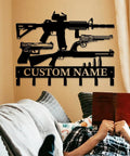 Gun Theme Wall Hooks For Keys And Clothes Personalized Cast Iron Key Holder And Coat Hanger In Matte Black hanging on wall