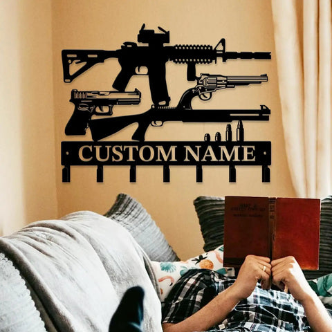 Gun Theme Wall Hooks For Keys And Clothes Personalized Cast Iron Key Holder And Coat Hanger In Matte Black hanging on wall