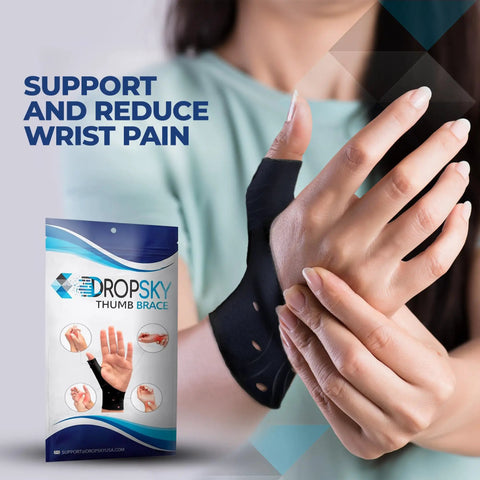 Hand wearing black thumb brace with gel pad, part of Thumb Brace 4 Pack Waterproof Splints With Gel Pad For Carpal Tunnel Arthritis.