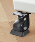 Close-up of Furniture Stoppers And Wheel Caster Cups Silicone Non Slip Pads under a chair wheel to protect floors, 8 pack everyday use.