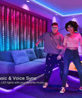 Two people dancing in a living room illuminated by RGB LED Curtain Lights With 200 LEDs, 6.5 Ft By 6.5 Ft Backdrop Fairy String Lights With App Control.
