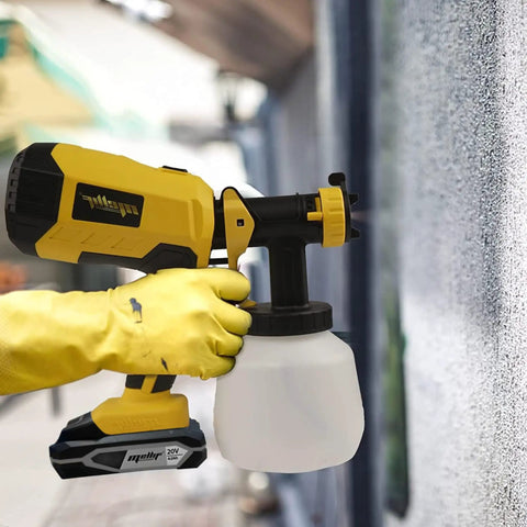 Person using Brushless HVLP Cordless Paint Sprayer 1200ML Cup With 4 Nozzles And 3 Spray Patterns That Works With 20V Batteries