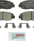 Bosch BC465A QuietCast ceramic brake pad set, front, four pads with hardware clips and lubricant packet.