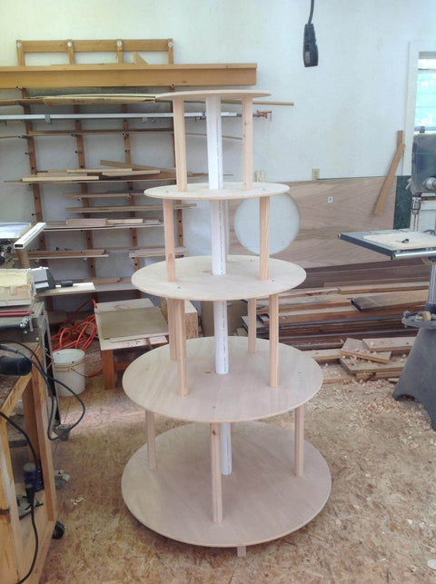 Woodshop with No Fuss Ellipse Router Circle Cutting Jig For Woodworking parts staged for project assembly.