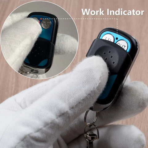 Close-up of Wireless Winch Remote Control Kit handset with buttons and work indicator, suitable for 12V/24V vehicles.