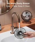Cleaning a detachable grill of 6.5 Inch USB Desk Fan With Quiet 3 Speed Settings, Ultra Portable Personal Mini Table Fan, wood grain base.