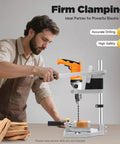 Man using Portable Drill Press Stand And Hand Drill Adapter Aluminum Base Single Hole Workstation for precise drilling on wood.