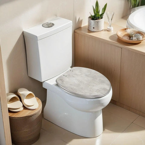 Elongated Concrete polished abstract silver grey grunge Toilet Seat on a white toilet, featuring a soft-close function.