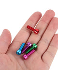 Ride Ready 30 Piece M5 Bike Bottle Cage Bolts Kit With Aluminum Socket Head Screws For Road Mountain City Bikes Water Bottle Holder Bracket Mounting Hardware Quick Install And Thread Wear Prevention, colorful bolts in hand