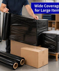 Heavy Duty Black Stretch Wrap Film 50 Cm Roll For Moving And Shipping securing large cartons and furniture in a workspace.