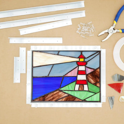 Pro Grade Stained Glass Layout Block Kit Comes With Eighty Durable Push Pins Includes 12 8 6 And 3 Inch Templates arranged with stained glass lighthouse design.